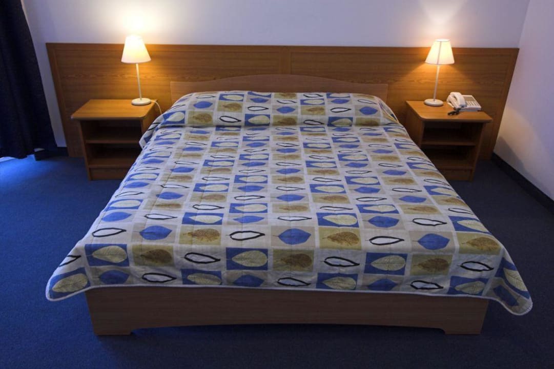 Doppelbett im Zimmer Hotel Arcus Residence