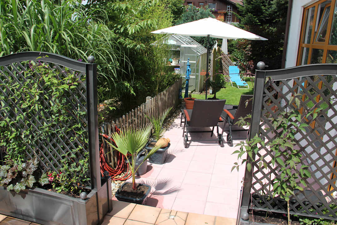 Gartenanlage Villa Relax - Ferienwohnungen mit Hallenbad & Relaxgarten