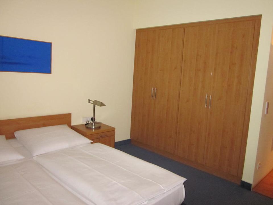 Bett und Schrank Aparion Apartments Berlin