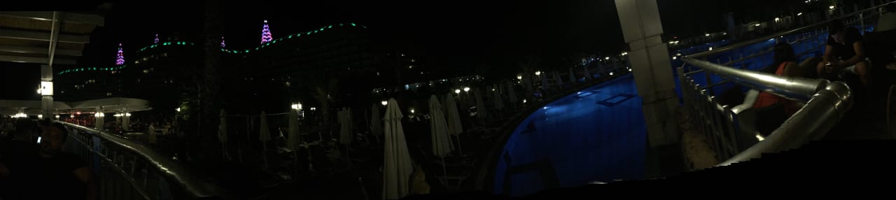 Poolanlage am Abend Hotel Delphin Imperial