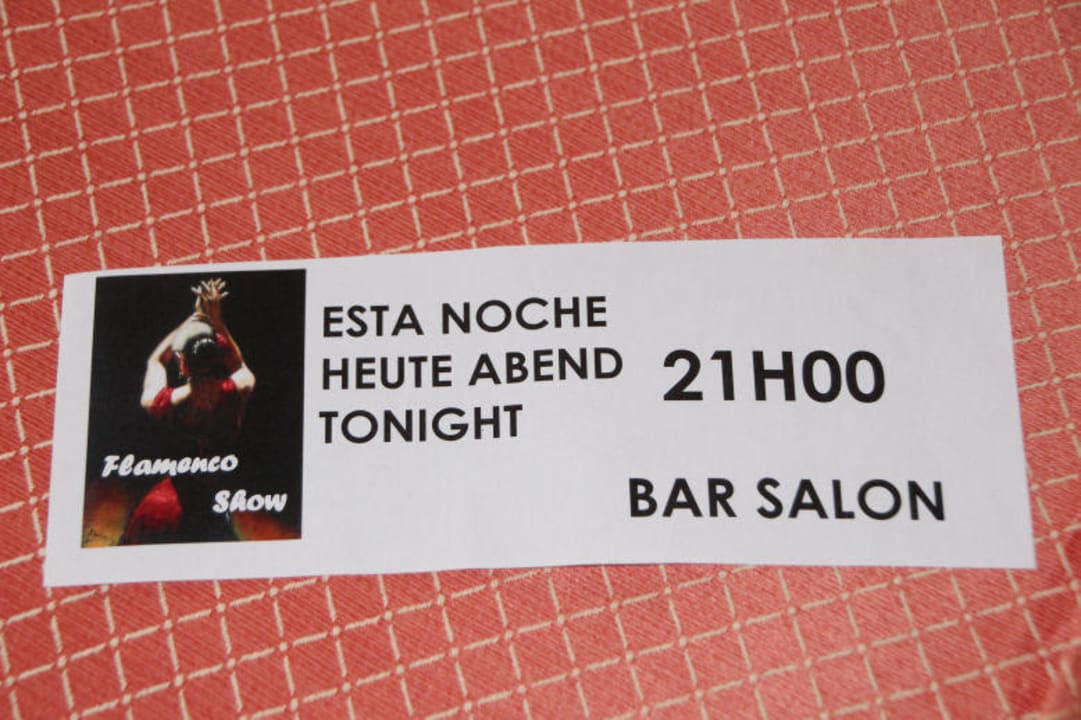 Hinweis auf das Programm am Abend  im Zimmer Hotel Serrano Palace