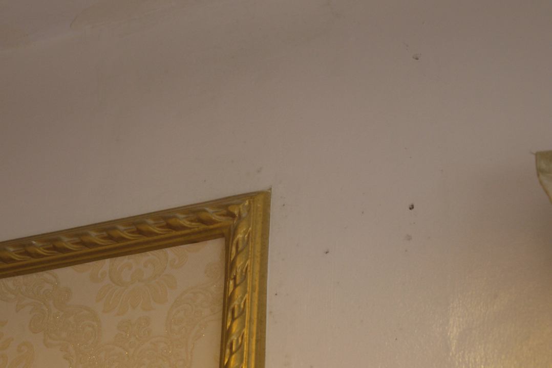 Dirty wall in room 602 Hotel Thaison Palace