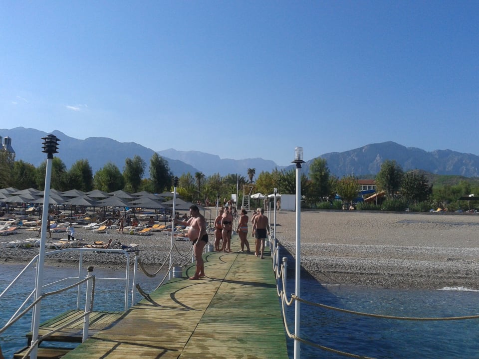 Blick vom Steg auf den Strand Le Jardin Resort