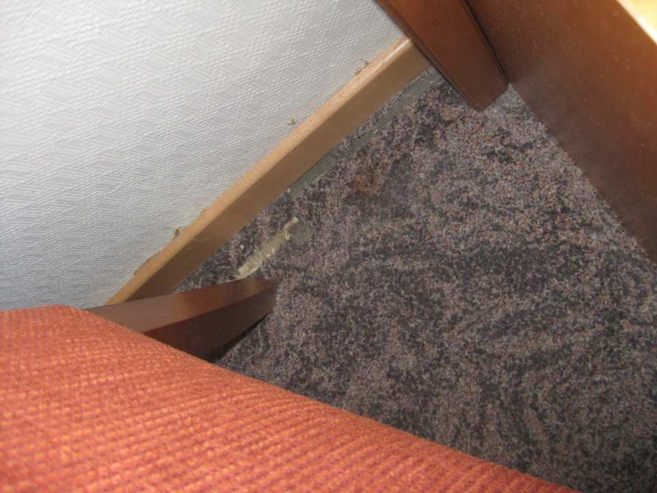 Teppich neben dem Bett Hotel Golden Tulip Central Molitor