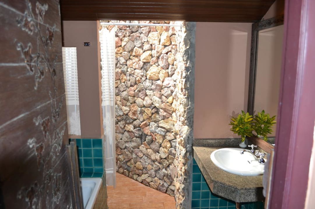 Badezimmer und Dusche The Fair House Beach Resort