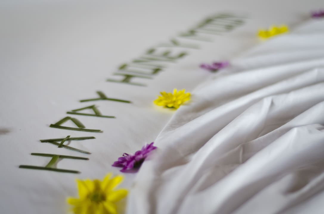 Our bed when we arrived Mirihi Island Resort