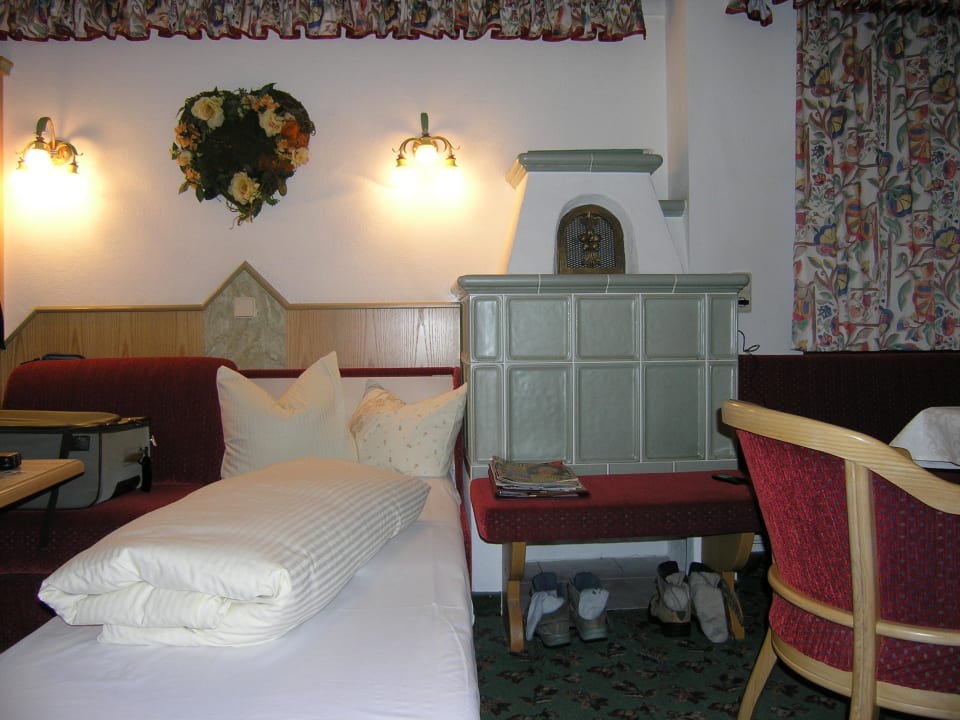 Zusatzbett mit Kamin Hotel Auffacher Hof