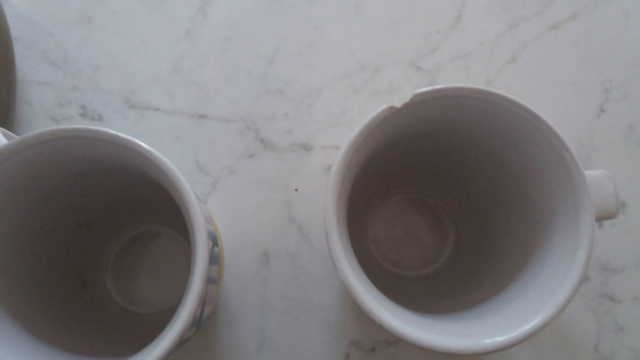 2 alte Becher für 4 Personen Apartments Porto Letizia