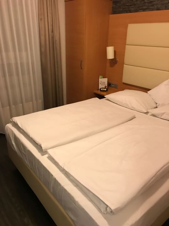 Schlafzimmer PLAZA INN Heilbronn
