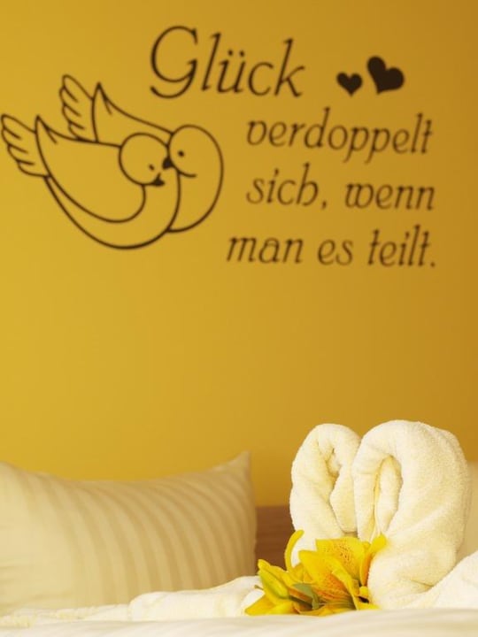 Wandmotiv Aparthotel Strandhus Familie Herrgott