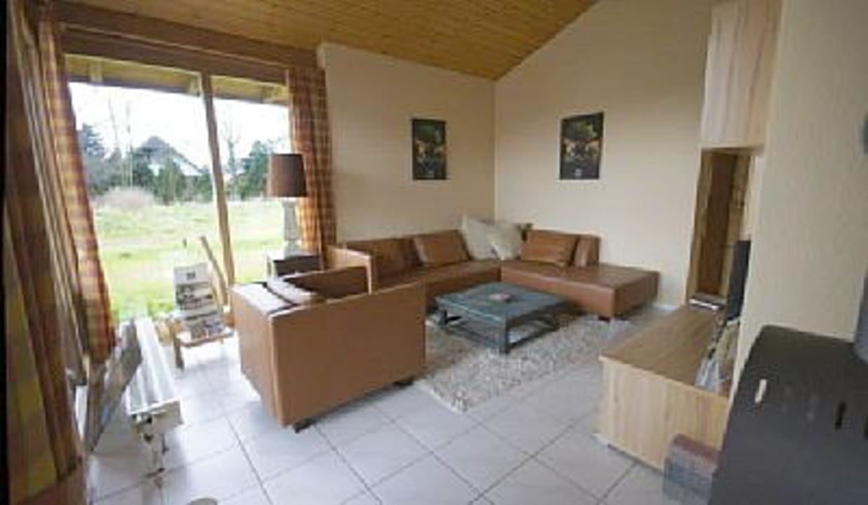 Wohnzimmer mit Couchgarnitur Feriendorf Sehestedt