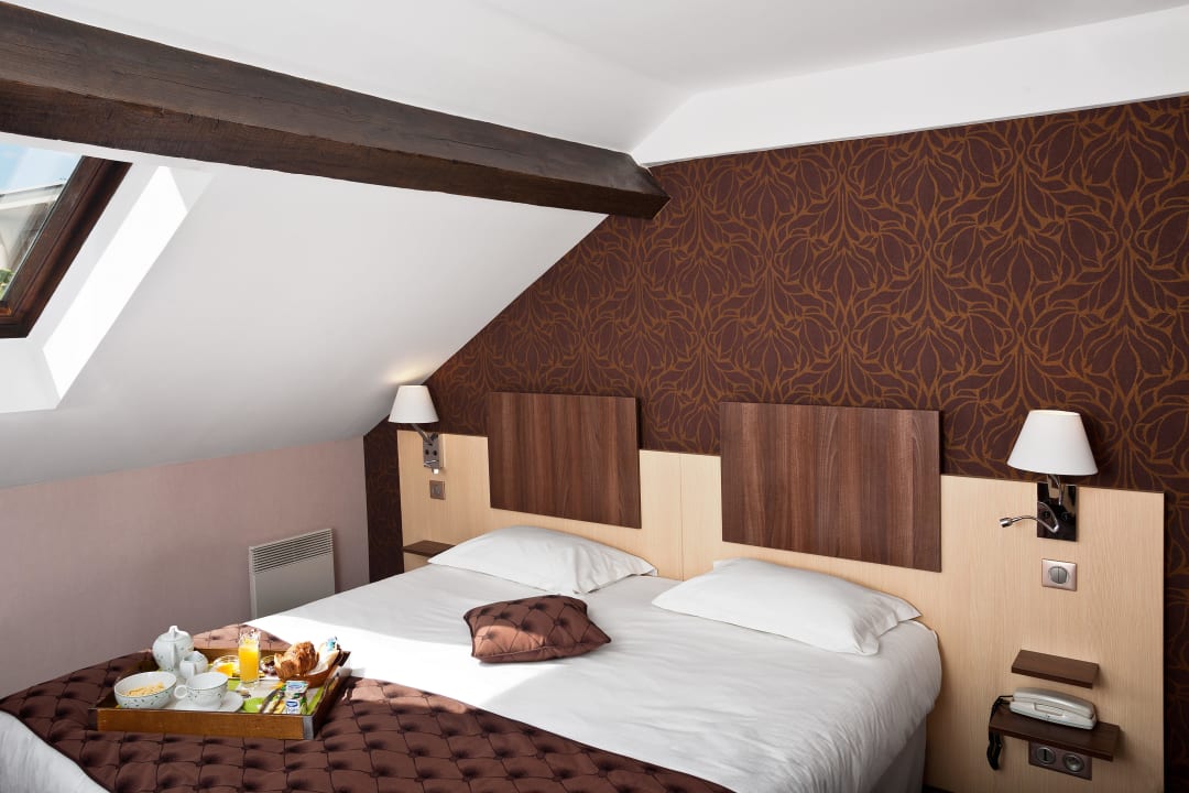 Chambre Confort en mansarde Arverna Hotel