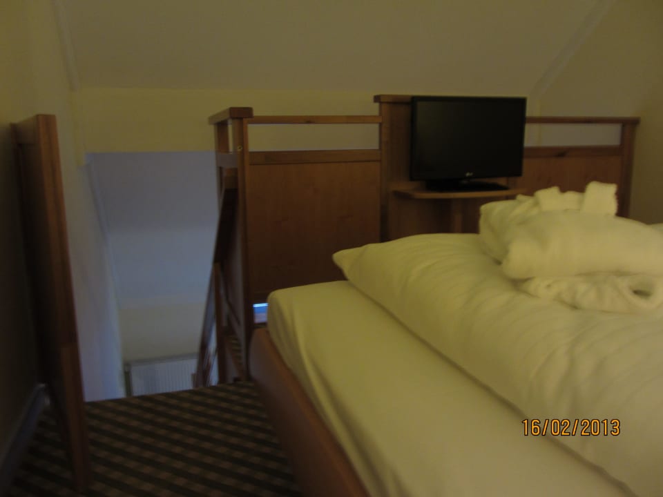 Gaubenzimmer, Bett unter dem Dach Aldiana Club Schlanitzen Alm