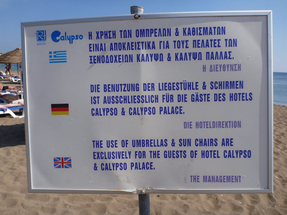 Hinweisschild am Strand Hotel Calypso Beach