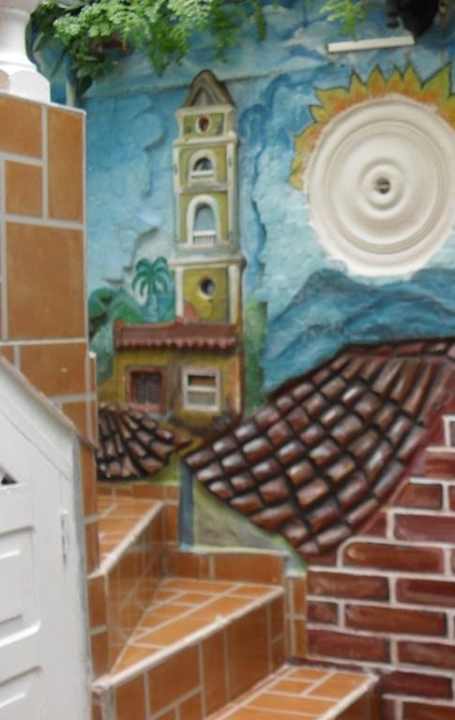 A escalera para ir a un restaurante.  Hostal y Casa La Milagrosa