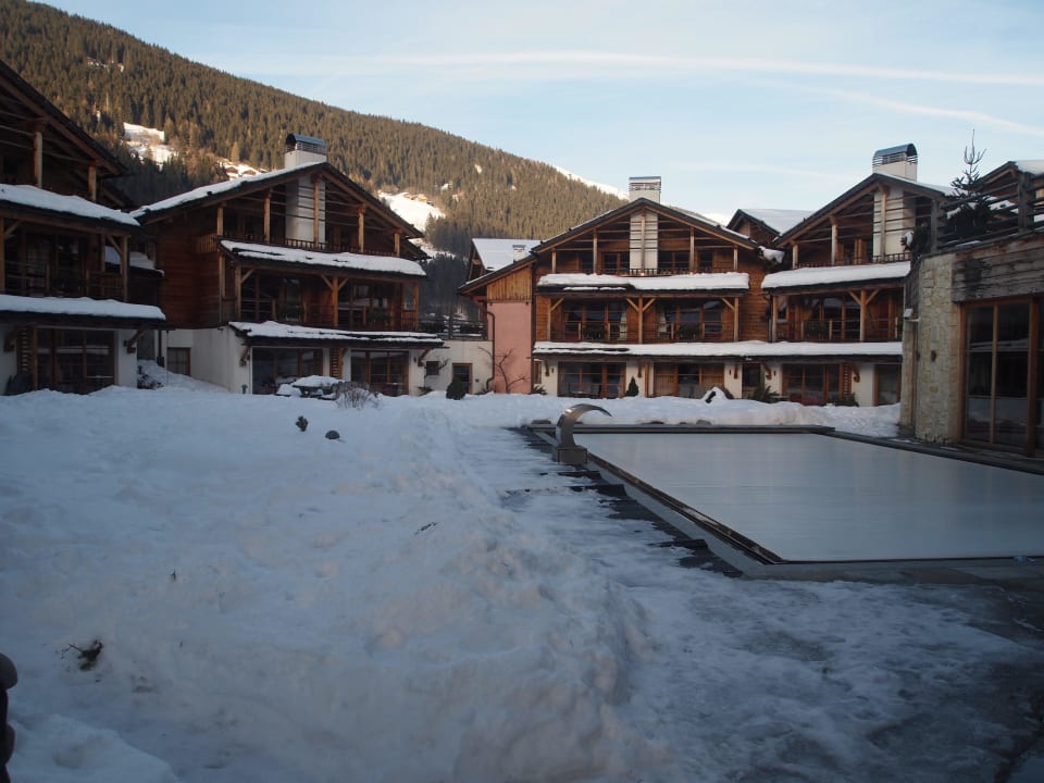 Außenpool und Chalets Post Alpina - Family Mountain Chalets