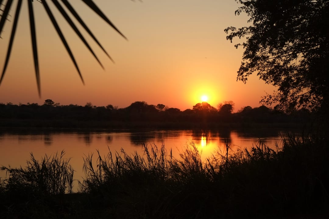 Sonnenaufgang am Okavango Hotel Ndhovu Safari Lodge