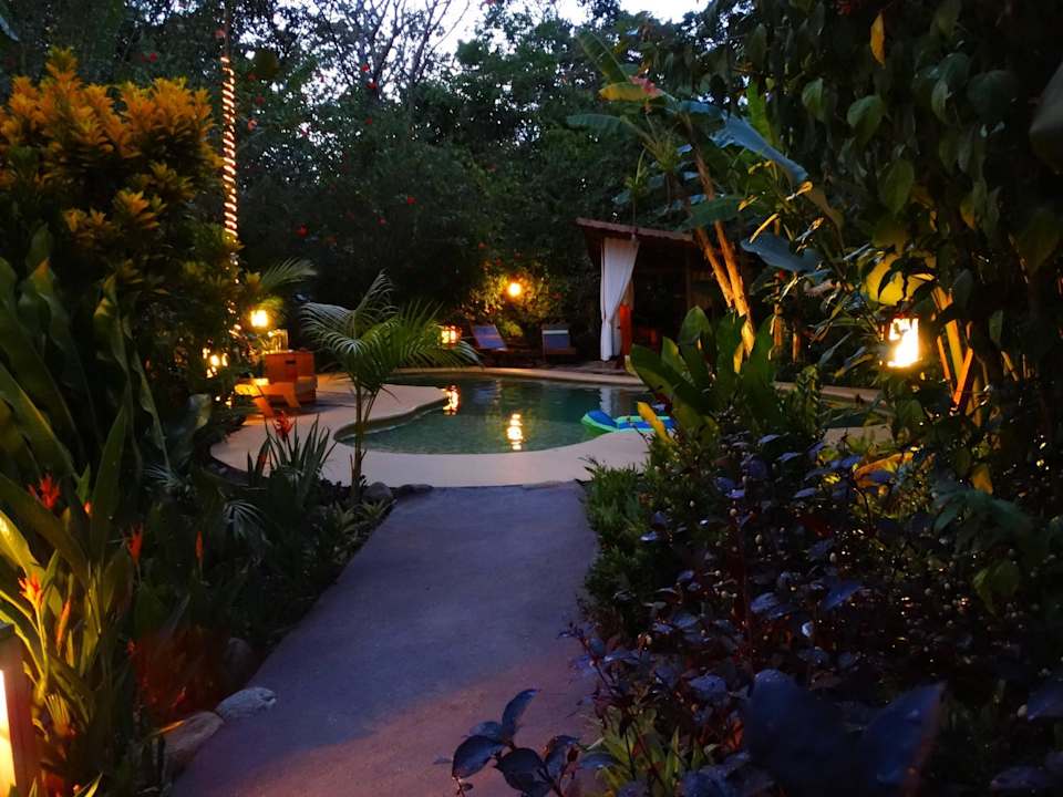 Pool by night Phidjie Lodge