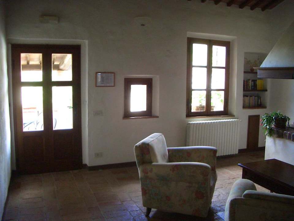 Aufenthaltsraum mit Kamin Hotel Borgo Gallinaio