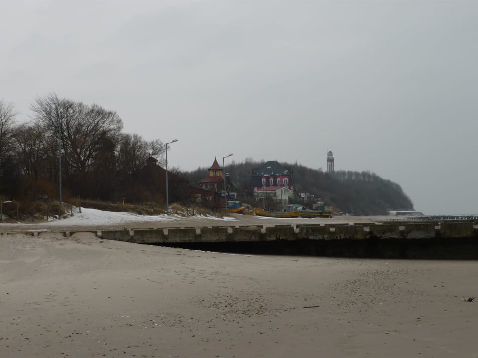 Strand mit Leuchtturm Oasis Resort & Spa