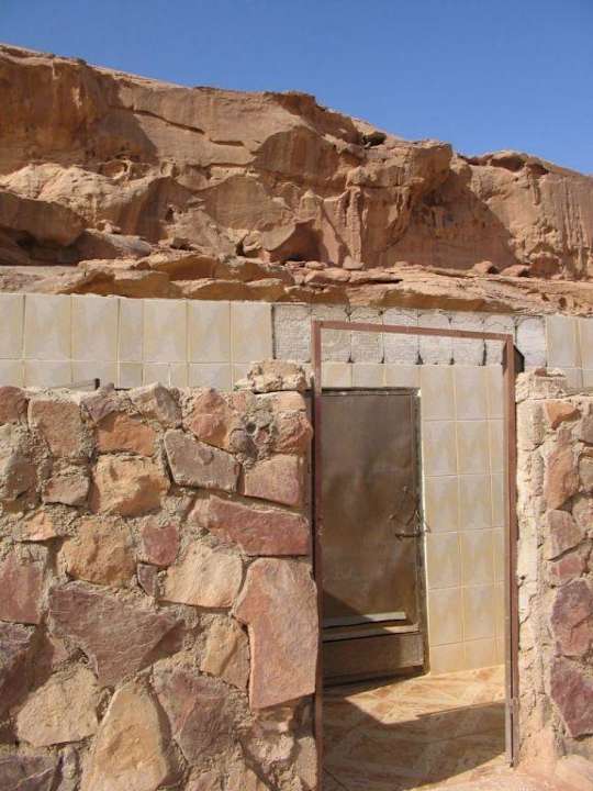 Shared bath an toilet under the tocks Oasis Desert Camp