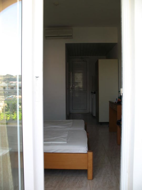 View from balcony to door Hotel Royal Rose