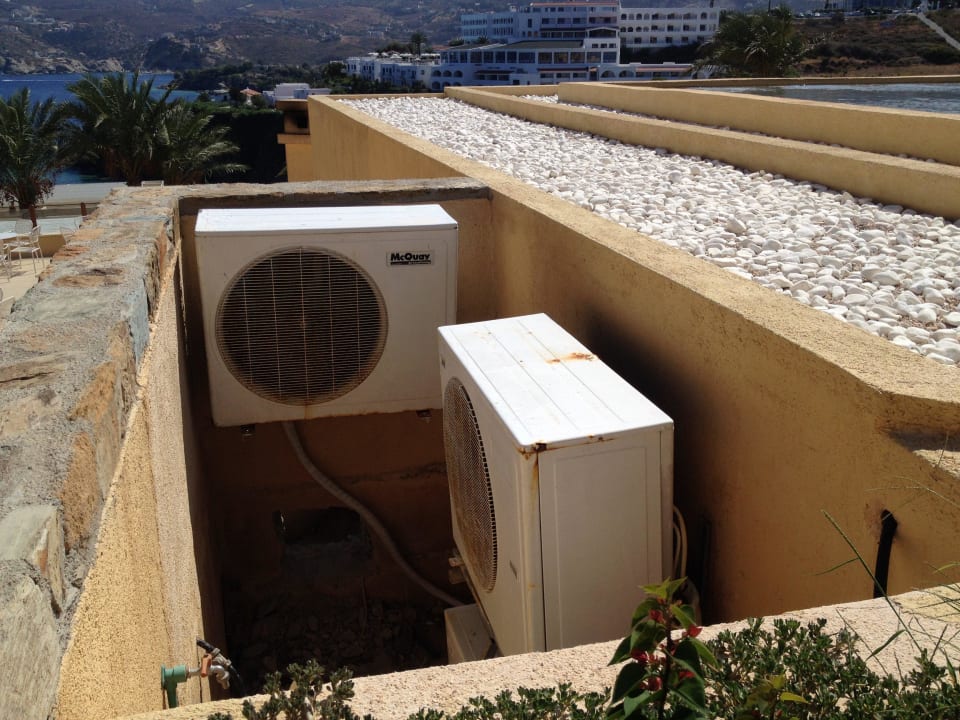 Air con engines rusty and open to view on the main Seaside A Lifestyle Resort