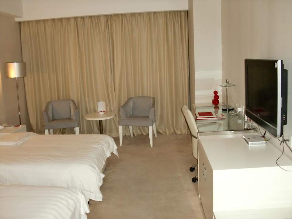 Schlafbereich Ramada Plaza Riverside Hangzhou