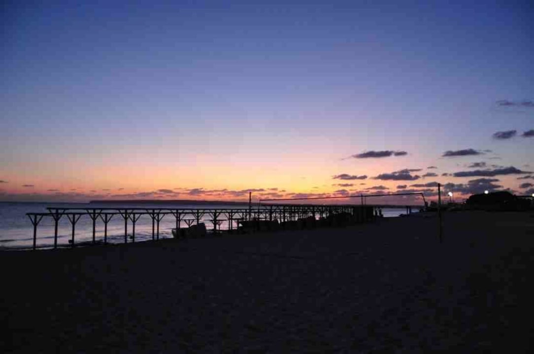Strand bei Sonnenuntergang Hotel Riu Palace La Mola