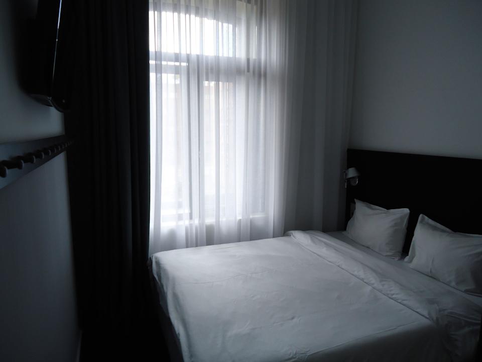 Кровать в стандартном номере AZIMUT Moscow Tulskaya Hotel