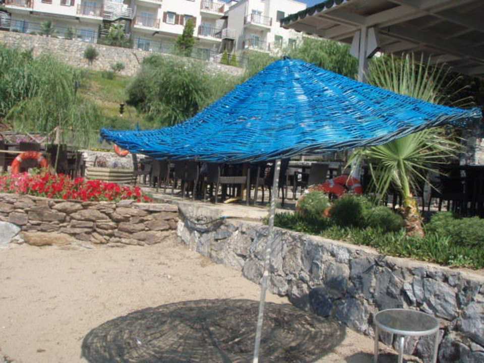 Parasol na plazy Aria Claros Beach & Spa Resort