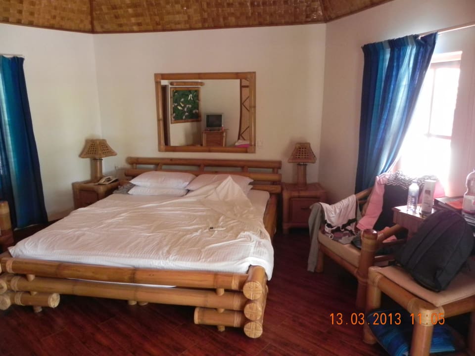 Bett in Bungalow 205 Thulhagiri Island Resort
