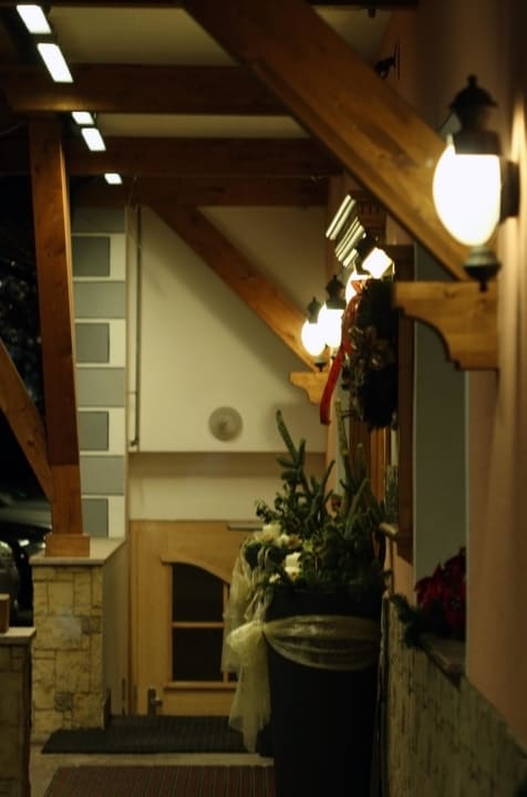 Вид на вход в ски-рум Hotel Cristallo Canazei