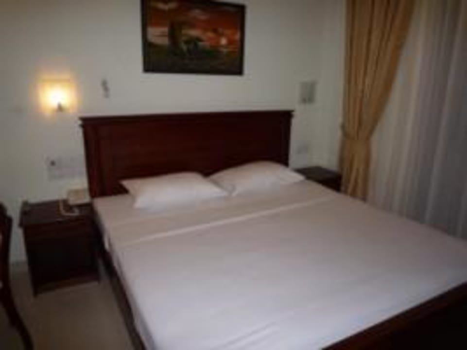 Doppelbett im Einzelzimmer Oak Ray Serene Garden Hotel