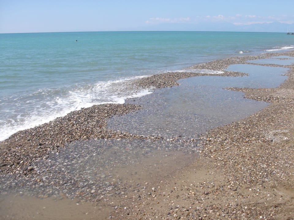 Pláž z kamínků Papillon Ayscha