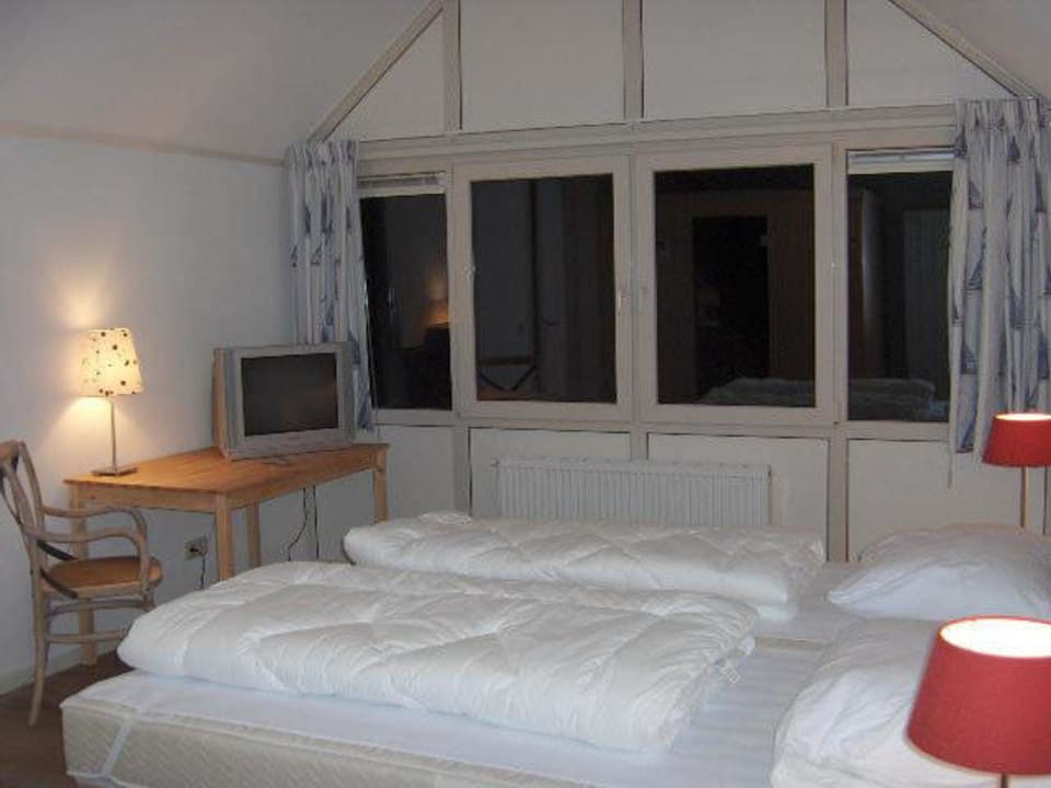 Een indruk van de twee grote slaapkamers 1 e etage Weidevilla 13