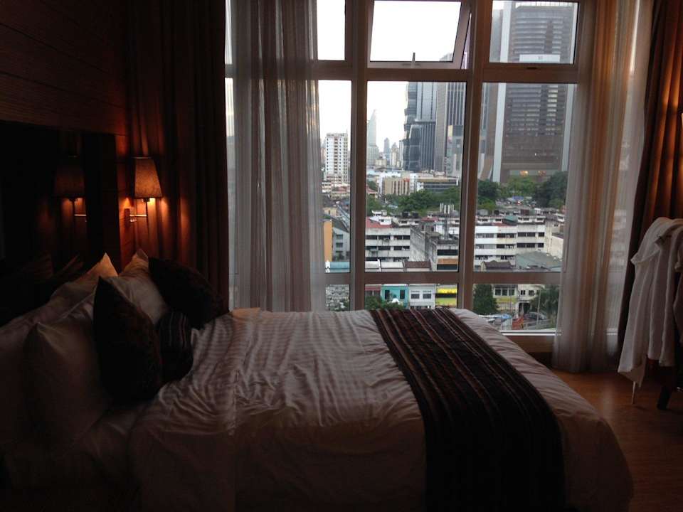 One of the two king size beds and the view Ramada Plaza Dua Sentral Kuala Lumpur