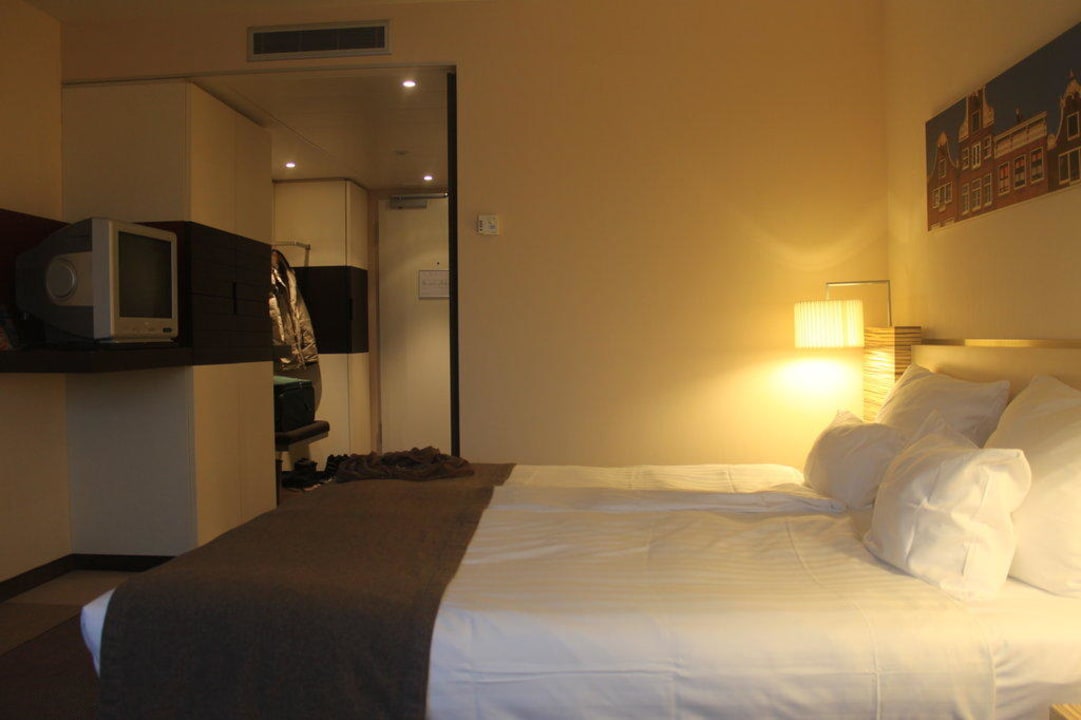 Bequeme Betten bei gemütlichem Licht Mövenpick Hotel Amsterdam City Centre