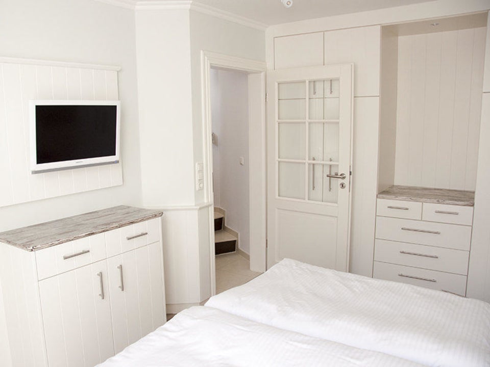 Schlafzimmer im Suitenhaus Hotel Ual Öömrang Wiartshüs