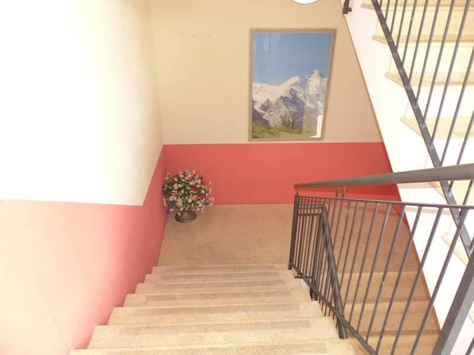 Treppenaufgang zu den Zimmern Hotel Residence Relais Du Lac