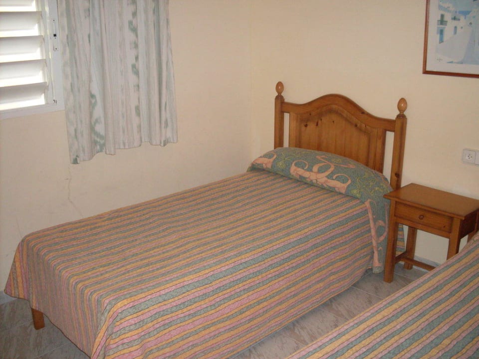 Das Schlafzimmer im Appartment Caprice Janeiro Hotel & Spa