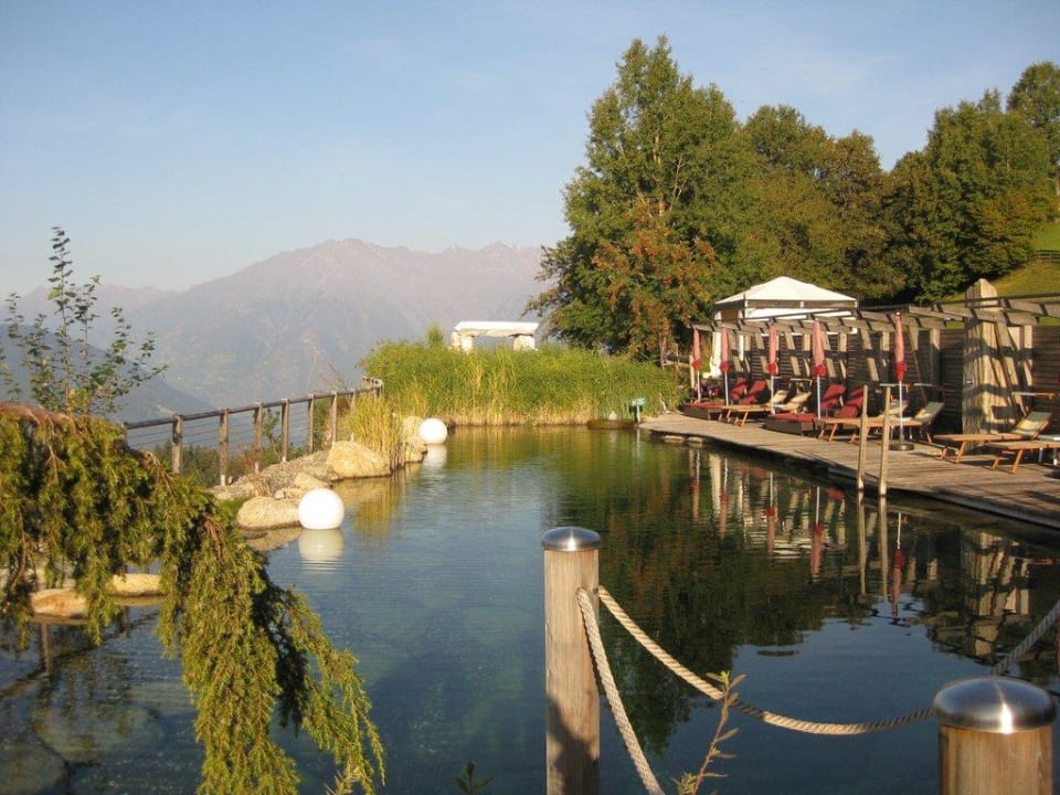 Morgenstimmung am Badeteich Hotel Chalet Mirabell