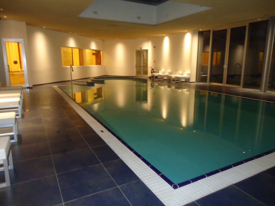 Swimmingpool am Abend Hotel Là Di Moret