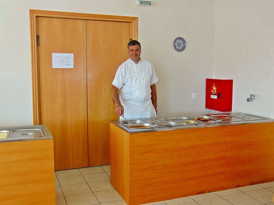 Der Koch am Buffet Georgia Hotel