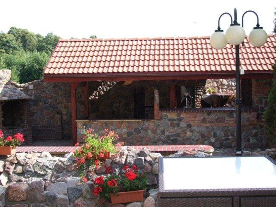 "Garten mit Grillstation" Hotel Kormoran Wellness Medical