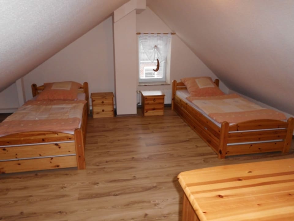 Zimmer Haus Küstenheide - Ferienwohnungen Sperling