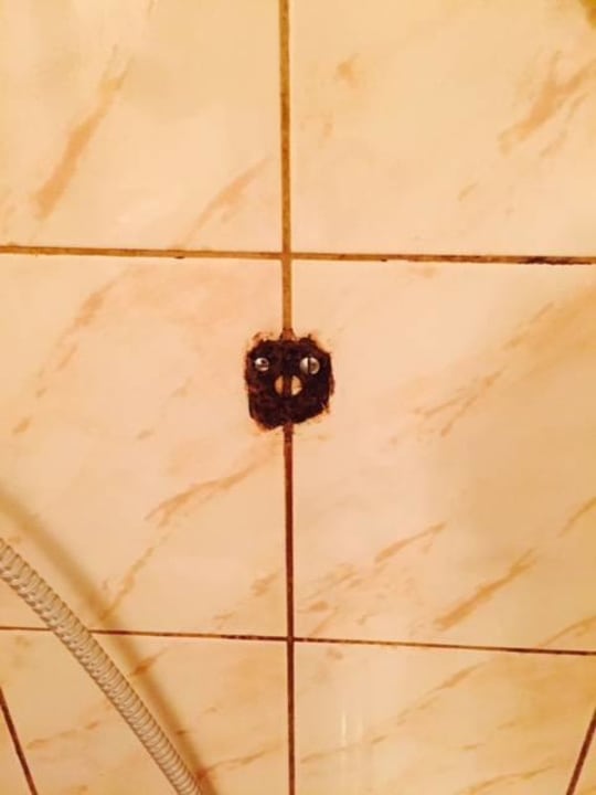 Dusche: Ein alter rostiger Halter Hotel Cryston