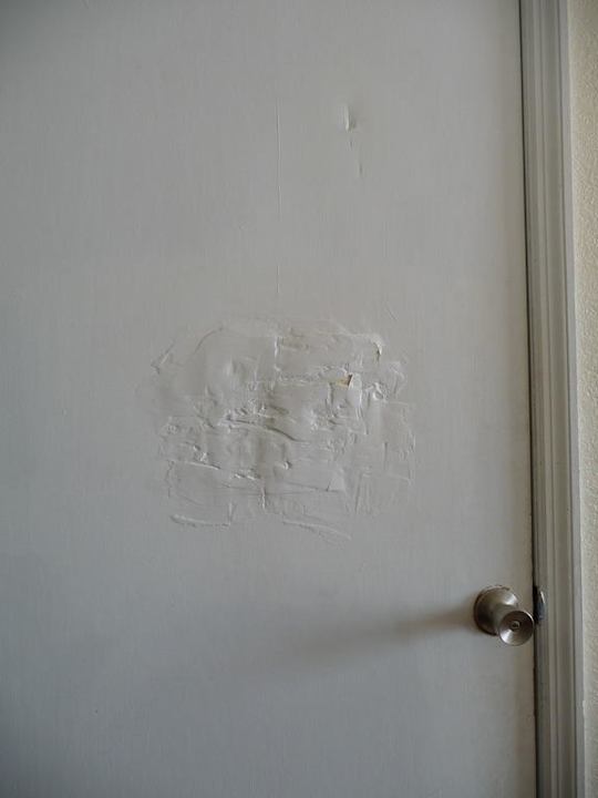 Zimmertür Hotel Roomba Inn & Suites