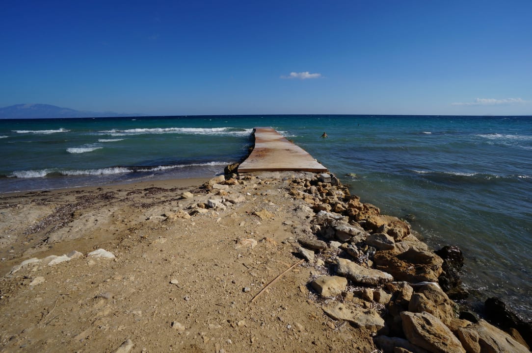 Steg zum Meer Hotel Belussi Beach