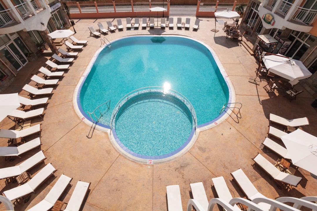 Swimming Pool View from inside hotel Apartments Silver Springs
